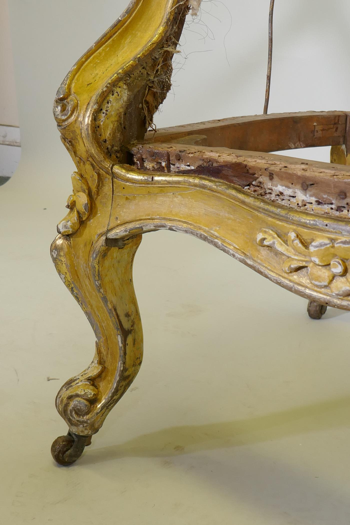 A C19th giltwood spoon back open arm chair with carved crest and scrolled, raised on cabriole - Image 3 of 5