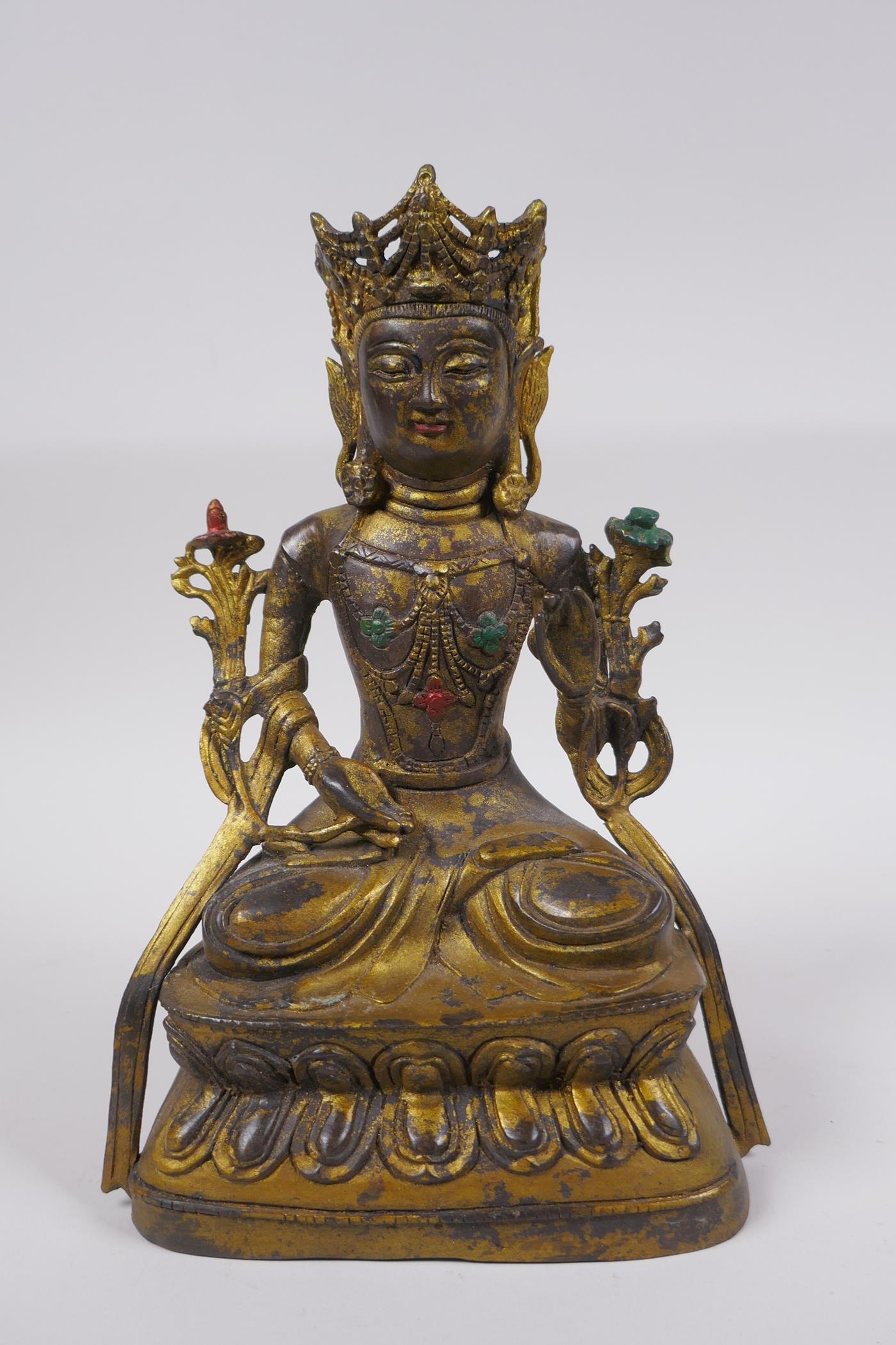 A Chinese gilt bronze figure of Buddha seated in meditation, impressed 4 character mark verso,