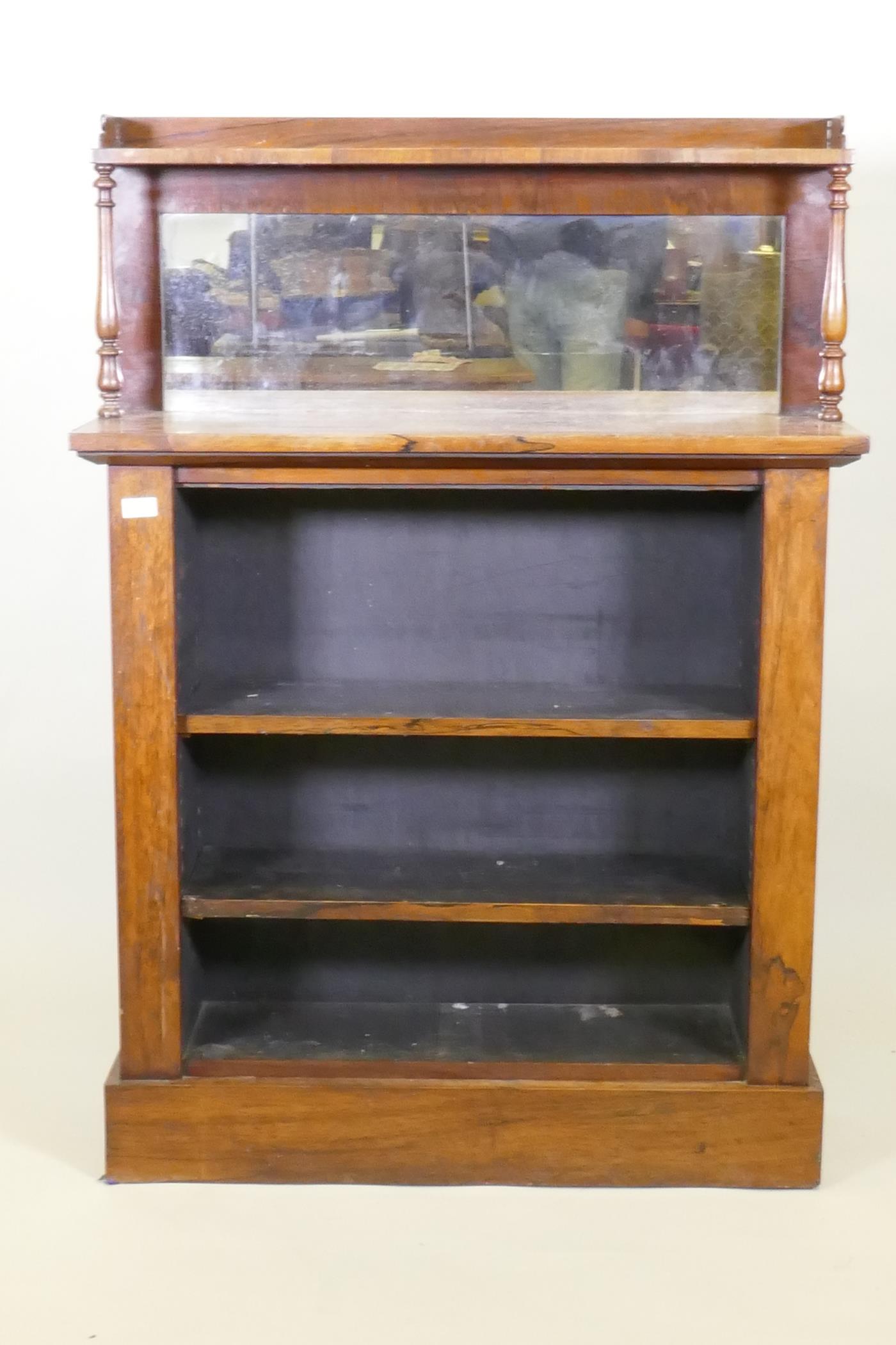 A C19th rosewood open bookcase, with mirror back and upper shelf with gallery, raised on a plinth - Image 2 of 3