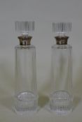 A pair of 1970s crystal glass decanters with silver mounts, London 1978, Israel Freeman & Sons