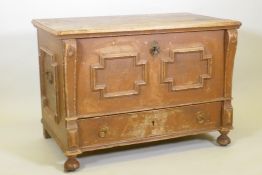 A C19th Continental painted pine mule chest, the lift up top revealing a candle box, the front and
