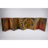 A Sino Tibetan printed concertina book depicting scenes from thangkas, 17 x 28cm