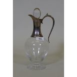 A glass claret jug with hallmarked silver mount, London 2000, J.A. Campbell, 30cm high