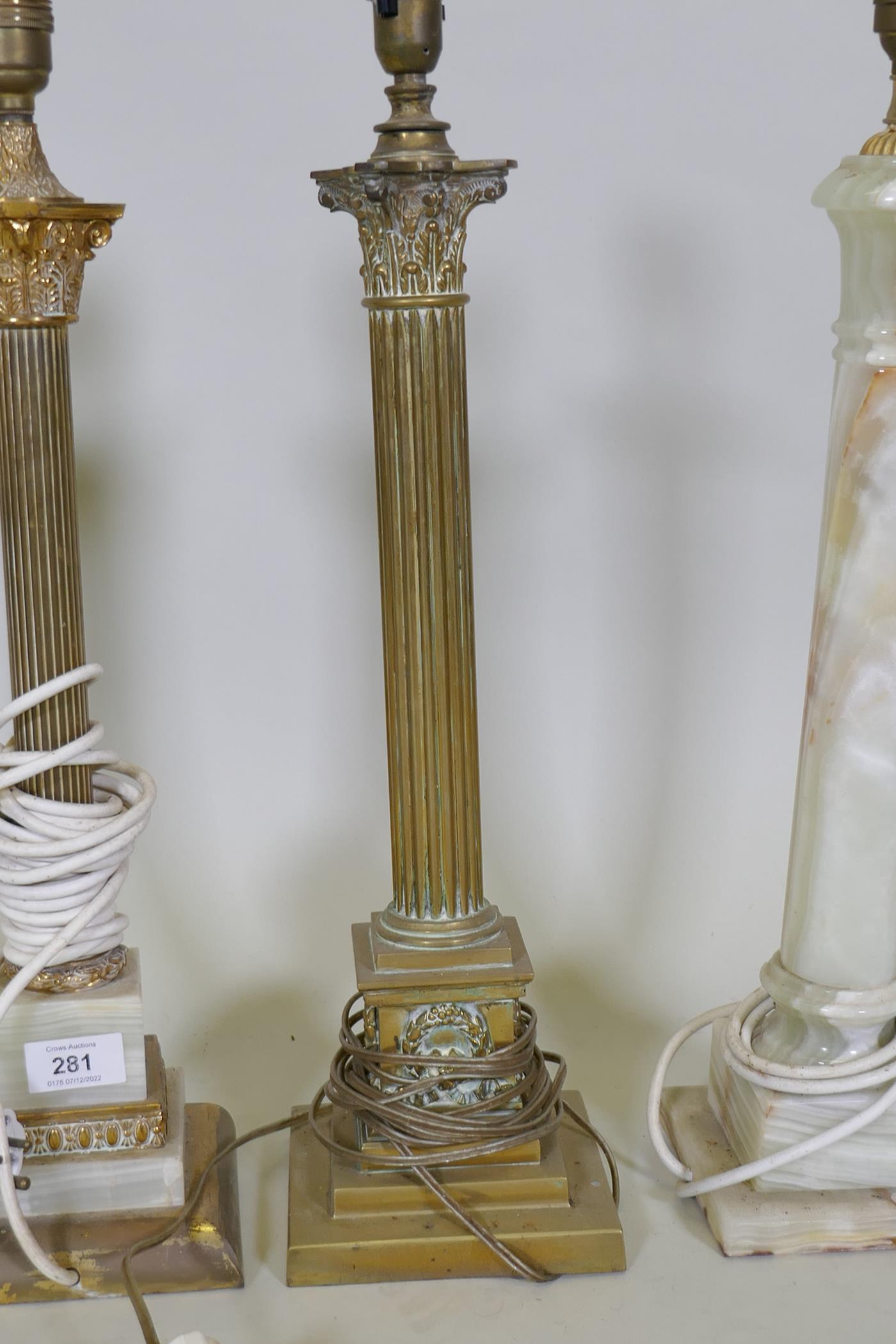 A pair of brass and onyx Corinthian column table lamps, a brass table lamp and an onyx table lamp, - Image 2 of 3