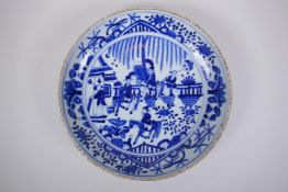 A Chinese Republic blue and white porcelain charger decorated with figures on horseback, 29cm