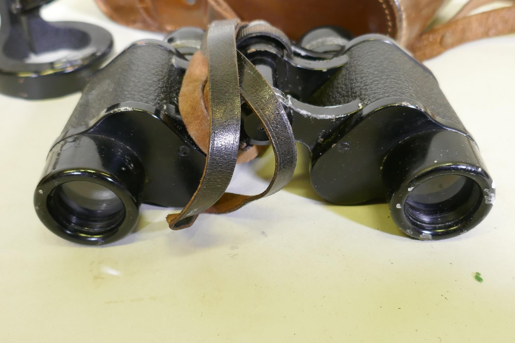 A Carl Zeiss Jena pair of binoculars, 6x24 lens, with leather case, and a Baker of London - Image 4 of 5