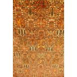 A Persian Bakhtiar multi-colour ground carpet, with Persian panel design, 335 x 250cm