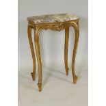 A C19th giltwood side table with inset marble top and carved frieze, raised on cabriole supports, 55