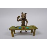 A cold painted bronze figure of croupier fox, in the manner of Bergman, 11cm wide