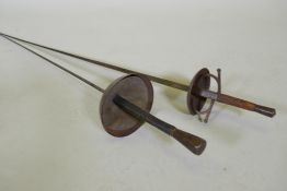 A fencing sword and another, C19th French, inscribed to blade 110cm long