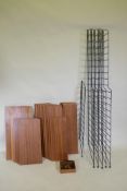 A mid century teak veneered modular shelving system comprising eighteen shelves, five tall and one