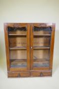 A Victorian mahogany glazed bookcase section with two drawers, 84 x24, 98cm high