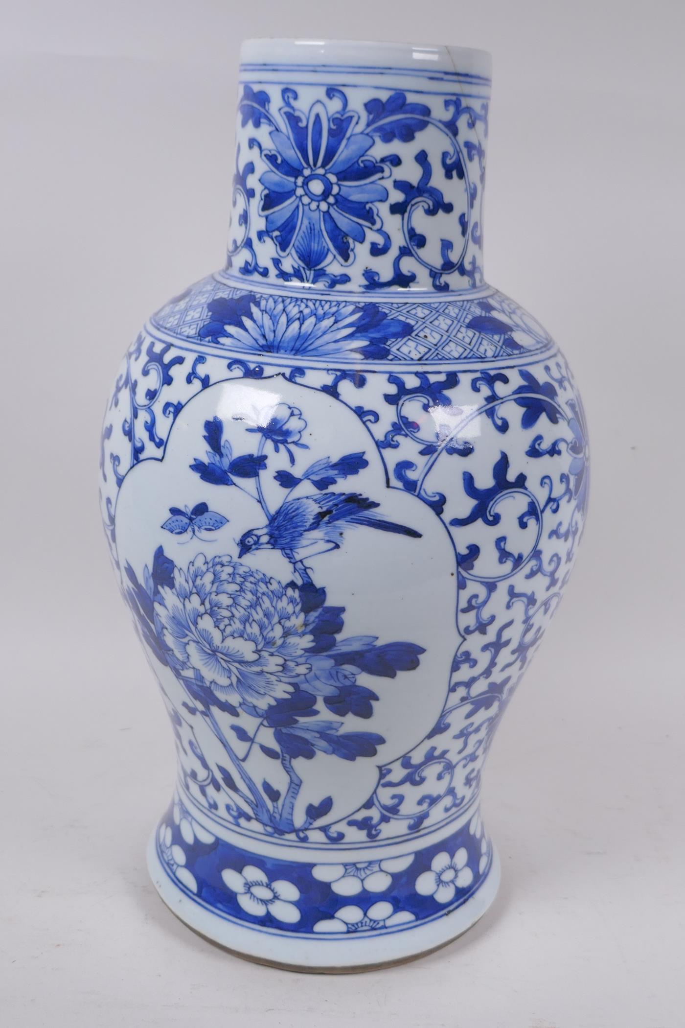 A Chinese blue and white porcelain baluster vase decorated with birds and flowers, AF, 35cm high - Image 3 of 6