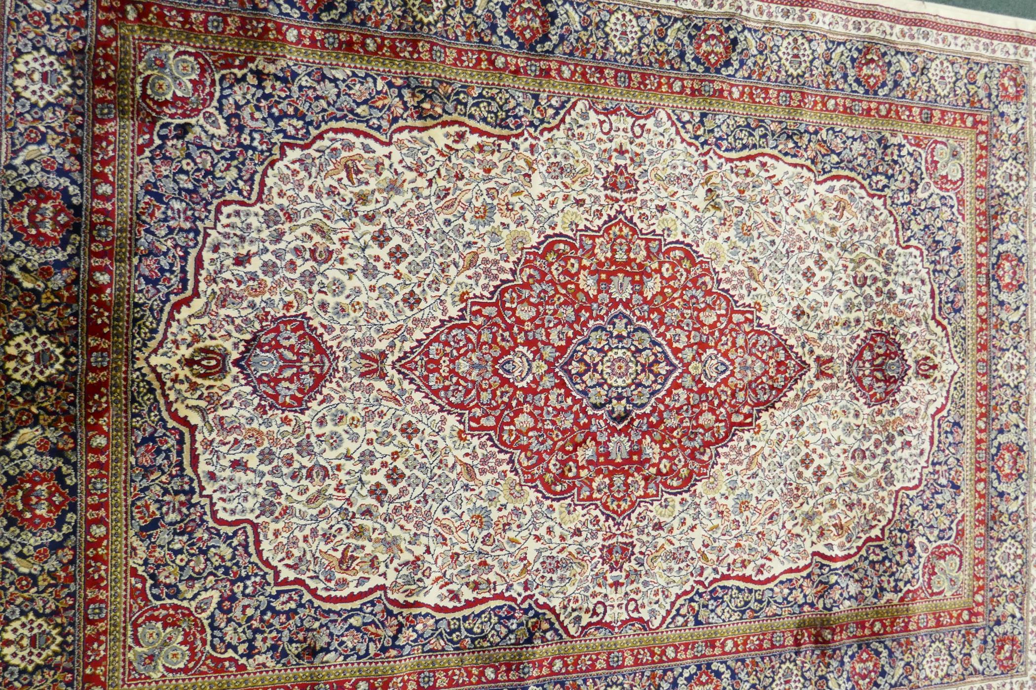 An ivory ground Kashmir carpet with central floral medallion design, 240 x 156cm - Image 3 of 5