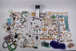 A quantity of assorted costume jewellery, including some silver pieces