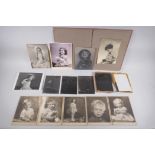 A collection of glass plate negative portraits and photographic prints of children by Marcus