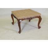 A Victorian carved walnut stool, raised on cabriole supports, 60 x 60 x 40cm