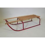 A vintage Triang sledge, 91cm long