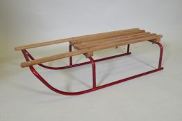 A vintage Triang sledge, 91cm long
