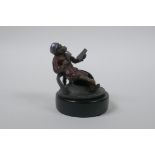 An Austrian style cold painted bronze figure of a monkey smoking a cigar, 7cm high