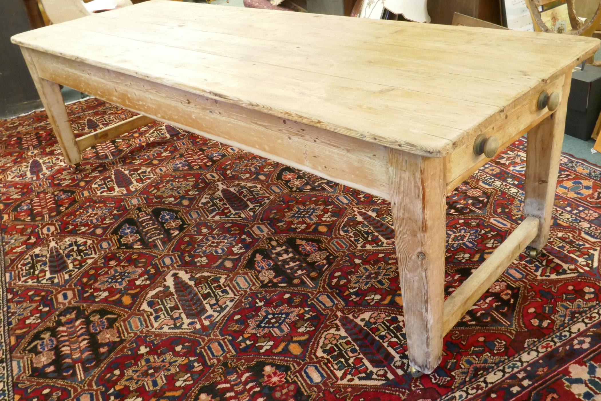 A large Victorian pine scullery table with plank top and end drawers, raised on square tapering - Image 6 of 6