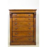 A C19th rosewood Wellington chest of six drawers, raised on a plinth base, 77 x 46 x 101cm