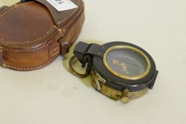 A WWI military Verner's pattern compass, marked 1917 No. 89327, in a leather case stamped T.