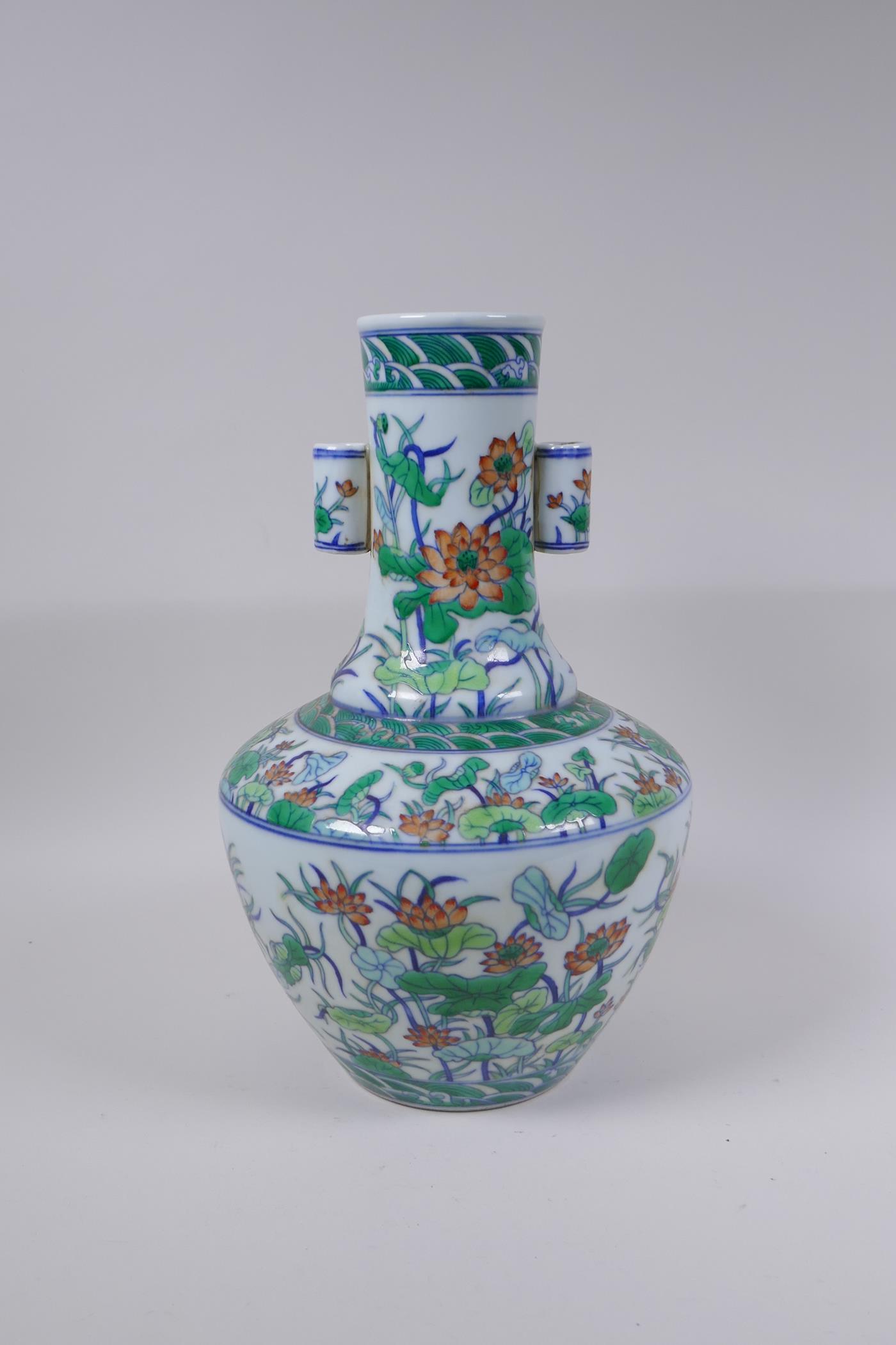 A doucai porcelain vase with two lug handles and lotus flower decoration, Chinese Qianlong seal mark - Image 3 of 5