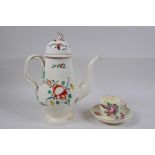 A late C18th Staffordshire creamware teapot, cup and saucer, with flat reeded handles, flower