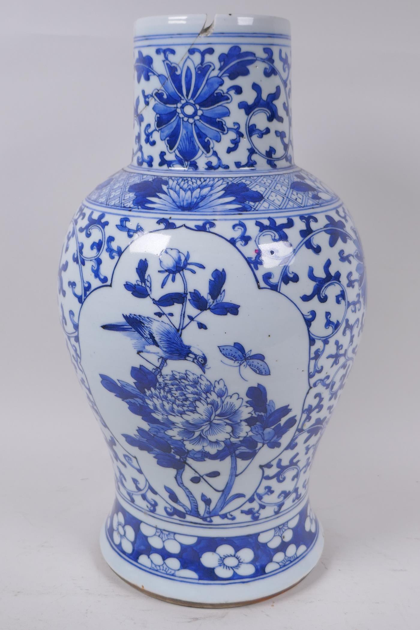 A Chinese blue and white porcelain baluster vase decorated with birds and flowers, AF, 35cm high