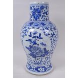 A Chinese blue and white porcelain baluster vase decorated with birds and flowers, AF, 35cm high