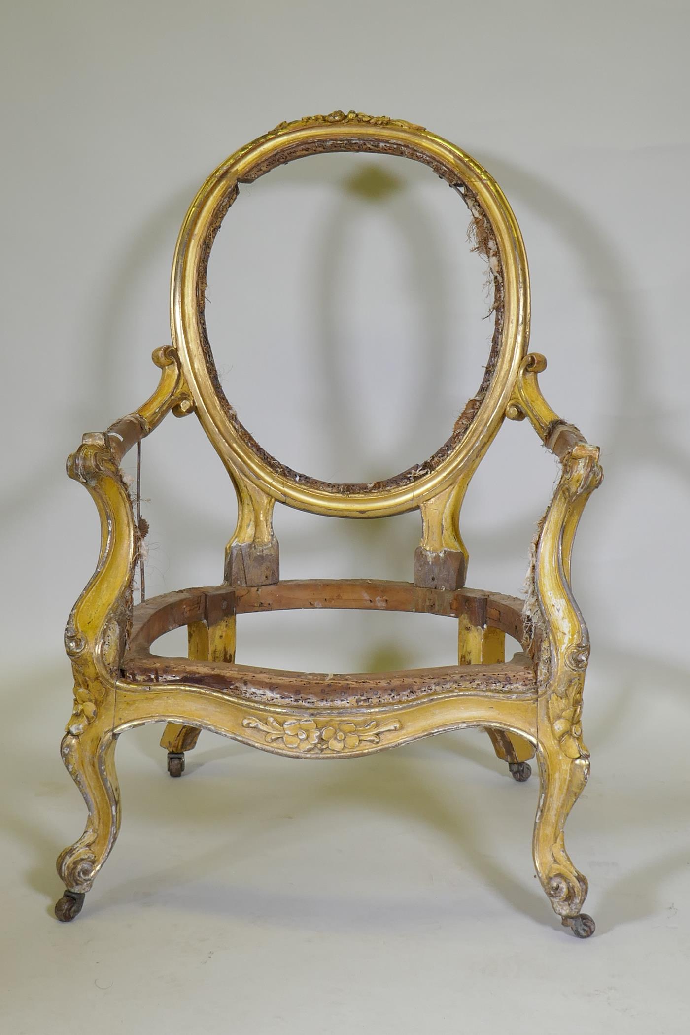 A C19th giltwood spoon back open arm chair with carved crest and scrolled, raised on cabriole - Image 2 of 5