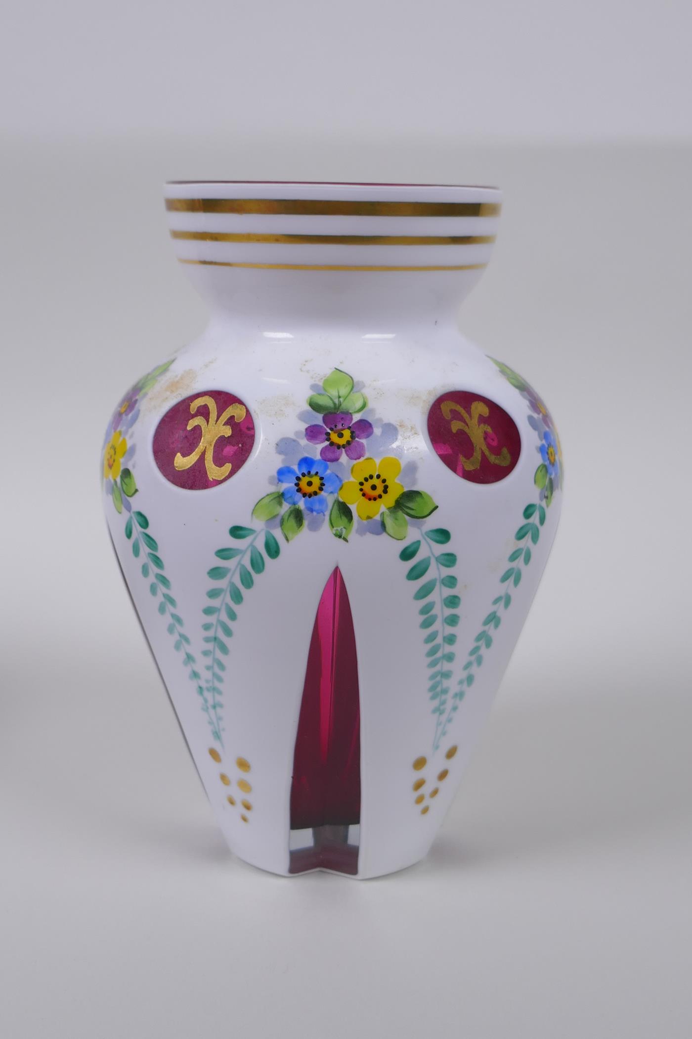 A Bohemian style overlaid ruby glass vase with hand painted floral decoration, and a similar pot and - Image 3 of 8