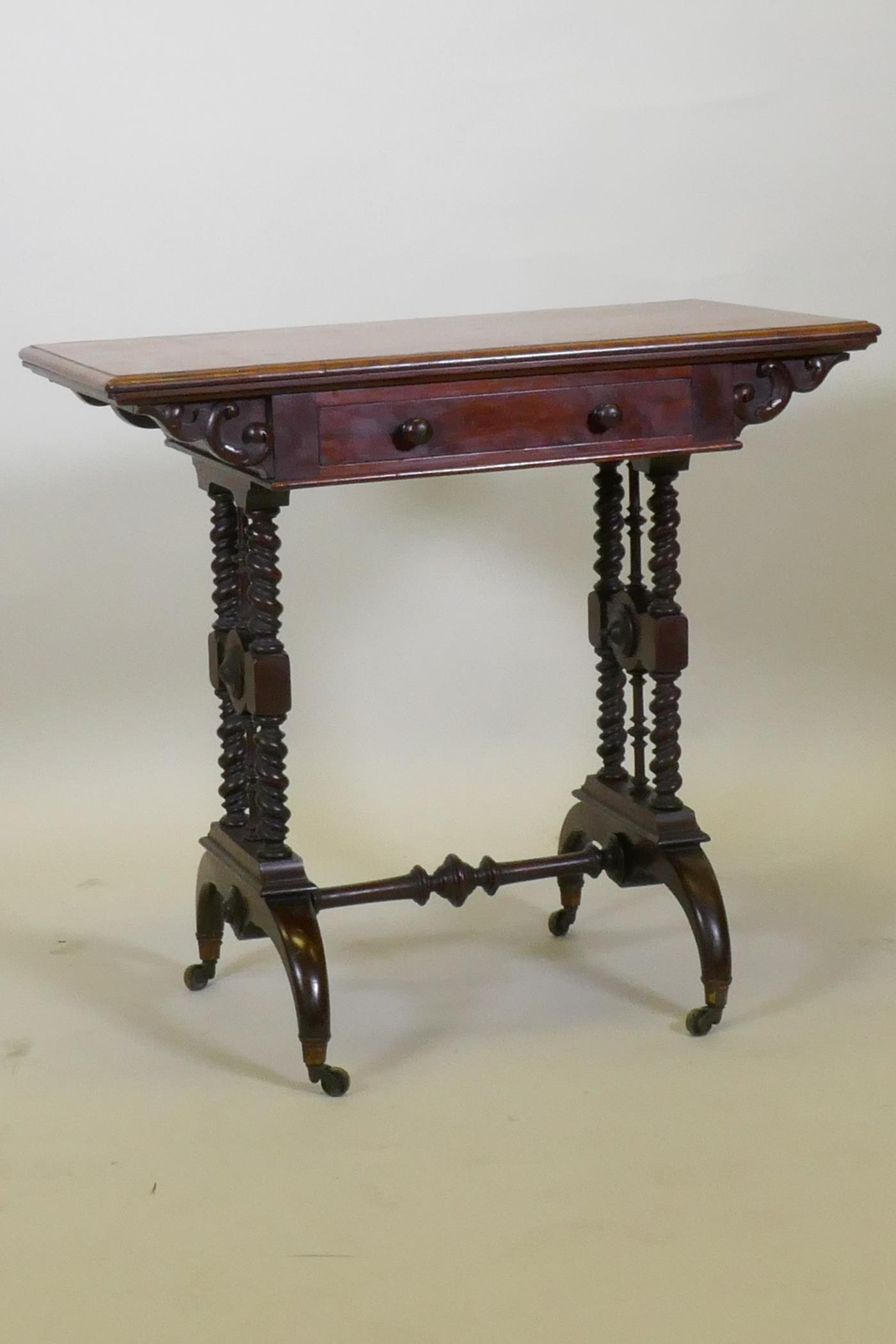 A C19th figured mahogany card table by Lamb of Manchester, with swivel and fold over top, baized