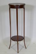 An Edwardian inlaid mahogany two tier jardiniere stand, raised on slender sabre supports, 32cm