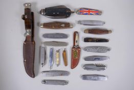 A quantity of assorted pen knives including a hallmarked silver knife and tortoise shell knife