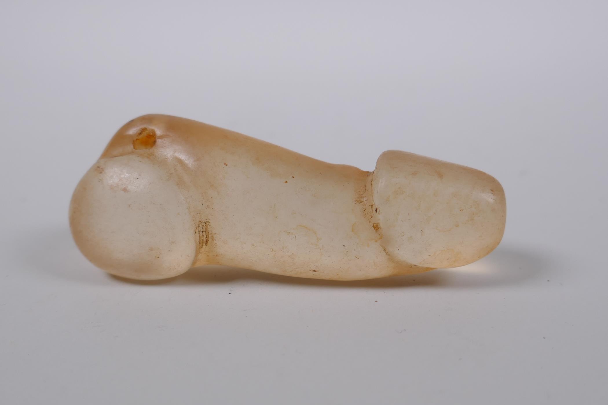 A carved crystal phalus pendant, 8cm - Image 2 of 2
