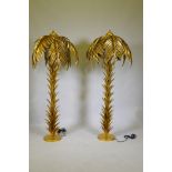 A pair of gilt metal floor lamps in the form of palm trees, 160cm high