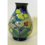 A Moorcroft 'Hypericum' vase designed by Rachel Bishop, marks to base, 19cm high