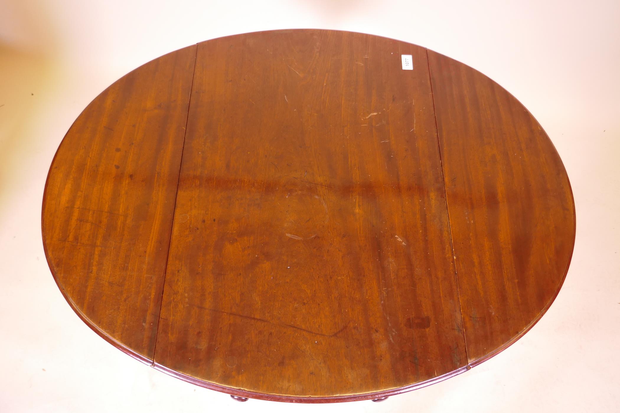 A George III mahogany Pembroke table with single drawer and bow ends, raised on square tapering - Image 5 of 7