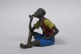 A Bergman style cold painted bronze figure of a pipe smoker, 6cm high