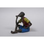 A Bergman style cold painted bronze figure of a pipe smoker, 6cm high