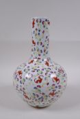 A Chinese polychrome enamelled porcelain bottle vase with bat decoration, GuangXu 6 character mark