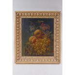 A C19th still life of fruit, oil on board, housed in an C18th carved pine frame, 28 x 34cm