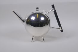 A Christopher Dresser style silver plated tea pot, 19cm high