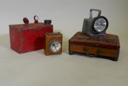 An antique carriage foot warmer with copper bottle, 29 x 24 x 9cm, a vintage torch, petrol can
