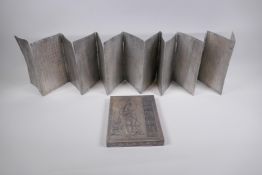 A Chinese white metal box containing a metal leaved concertina book with repousse inscriptions, 15 x