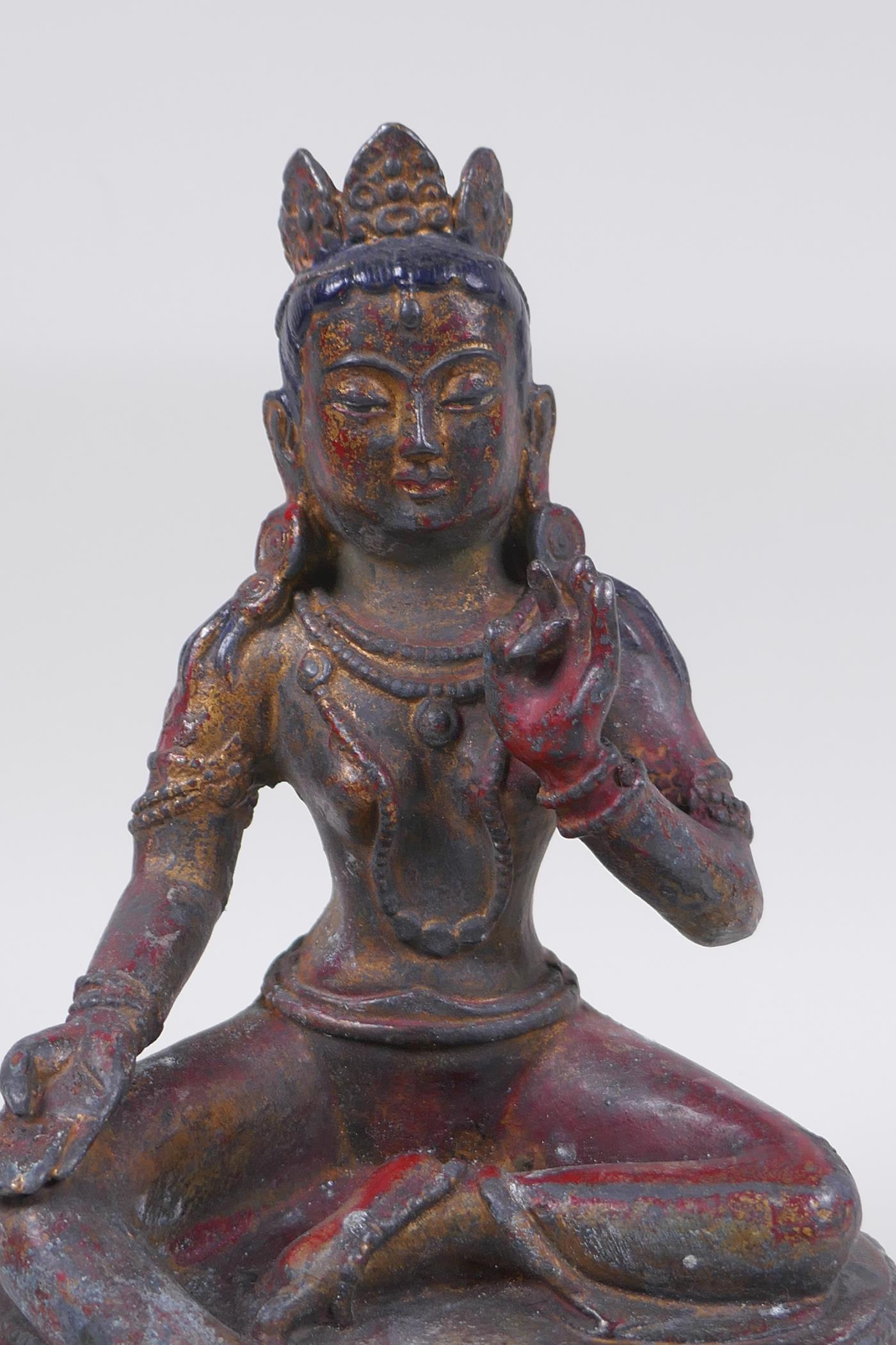 A Sino Tibetan bronze figure of a female deity with the remnants of gilt patina, 20cm high - Image 2 of 6