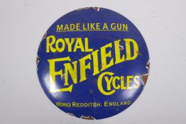 A vintage style Royal Enfield enamel advertising sign, 30cm diameter