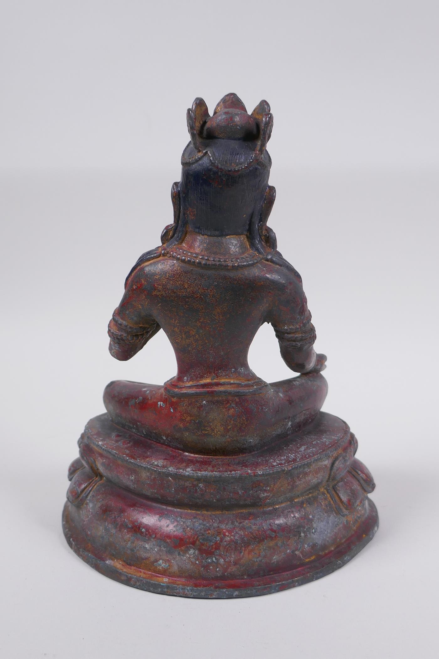 A Sino Tibetan bronze figure of a female deity with the remnants of gilt patina, 20cm high - Image 5 of 6